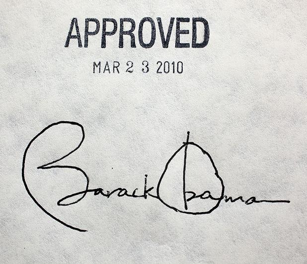 President Obama's signature on the affordable healthcare act